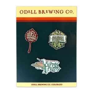 Odell lapel pin 3-pack on custom display card.